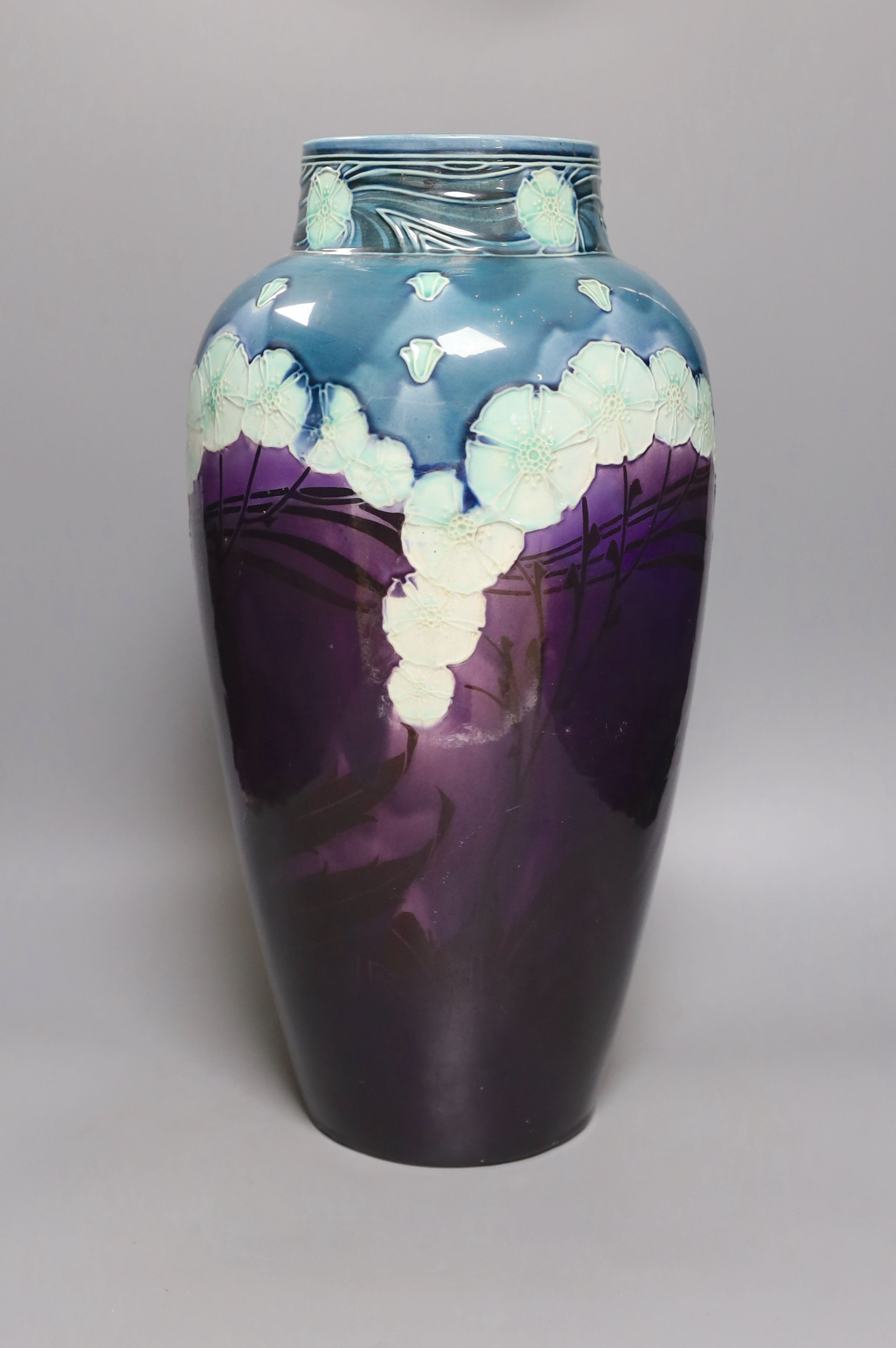 A large Minton Secessionist floral decorated vase, 48 cms high-restored.